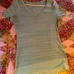 Faded teal and white top